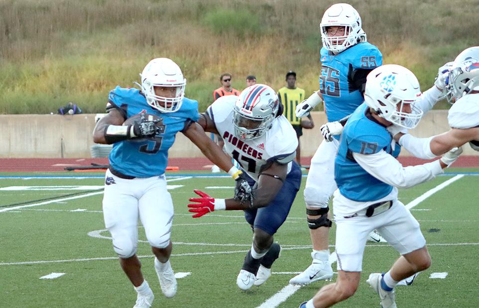 Nicholas Jarrett fight for yardage against MidAmerica Nazarene Saturday night. --- Photo by Keona Hirales.