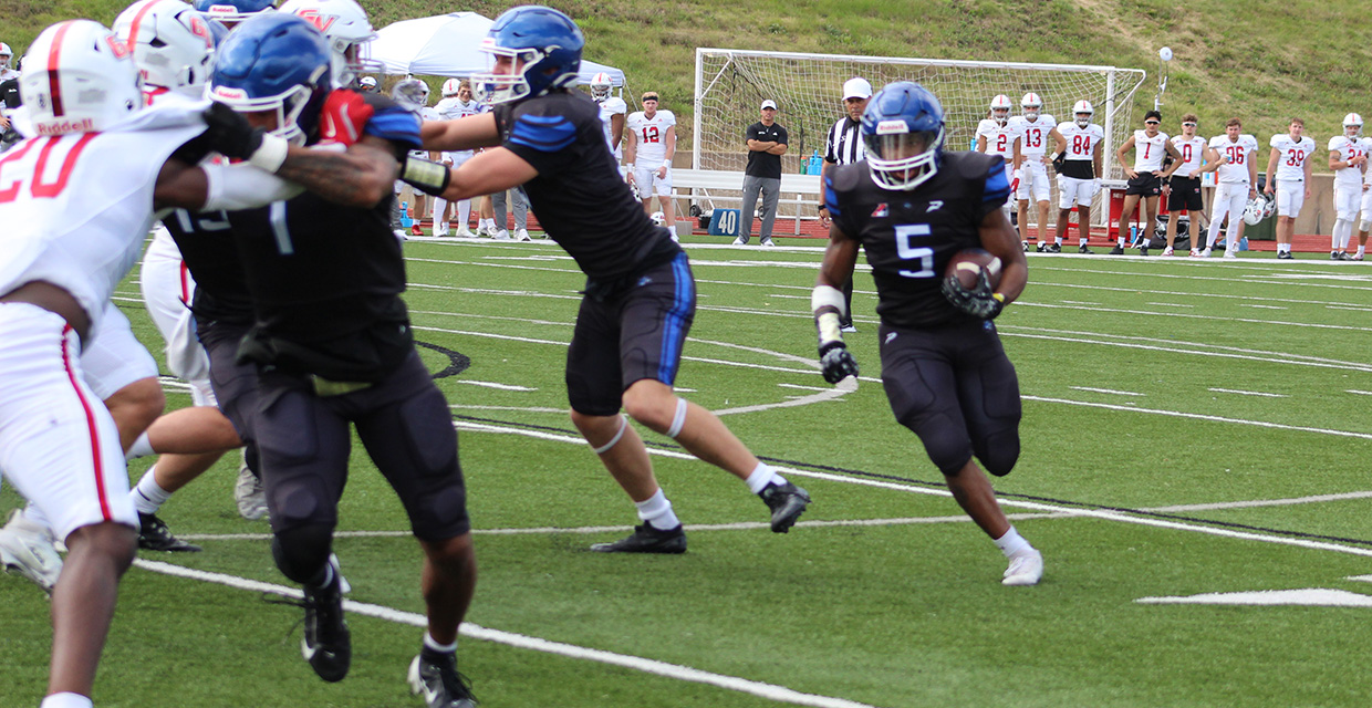 Big Second Half Carries Wildcats to First Victory